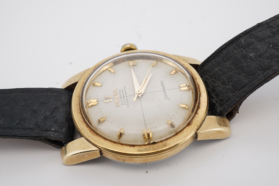 A gentleman's mid 1950's steel and gold plated Omega Seamaster Automatic Chronometer, with cross hair dial and baton numerals, movement c.354, case diameter 35mm, on an associated leather strap, no box or papers.